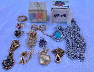 Vintage AVON Jewelry - Assortment of rings, necklaces, broches, and earrings