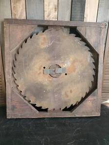 lot 27 image: Vintage Saw Mill Blade In Rail Road Crate