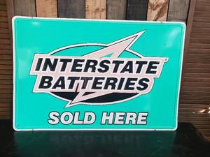 lot 32 image: Large Embossed Interstate Battery Sign