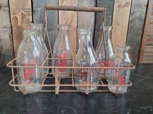 lot 43 image: Antique Milk Bottle Carrier and Bottles