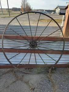 lot 61 image: 54 Solid Antique Impliment Steel Wheel