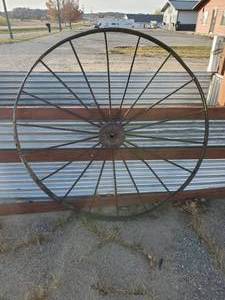 lot 76 image: Solid 54 Vingtage Impliment Steel Wheel
