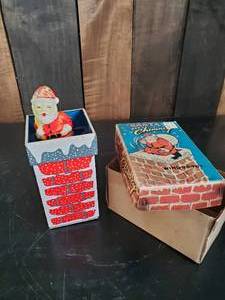 lot 87 image: Very RARE Tin Wind Up Santa in Chiminey