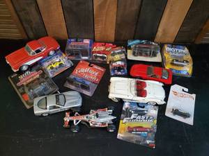lot 95 image: Group of toy Cars Most Still in their Blister Packs
