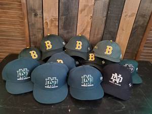 lot 97 image: Lot of UND and NDSU Baseball Hats Never Worn
