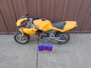 49cc min pit bike. Good compression. Otherwise untested. Appears complete. As shown.