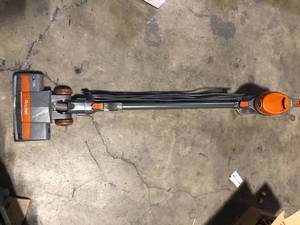 lot 26 image: Shark Rocket Bagless Corded Stick Vacuum for Hard Floors and Area Rugs with Powerful Pet Hair Pickup in Orange  Customer Returns See Pictures