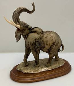 lot 86 image: Giusepe Armani Hard Porcilain Elephant Sculpture Statue On Wood Base 11 x 11 34