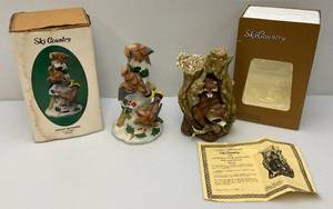 lot 134 image: Vintgae Sky Country (Cedar Waxwings) & The Third National Ski Country Club (Racoons) Decanter (Empty)