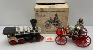 lot 140 image: Jim Beam 1867 MISSISSIPPI Fire Engine & Turner Locomotive Decanters (EMPTY)