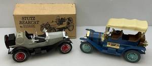 lot 143 image: Jim Beam Blue Thomas Flyer & Grey Stutz Bearcat Decanters (EMPTY)