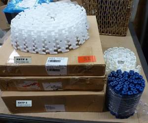 lot 31 image: 3 boxes plus 3 pieces of FlexLink plastic conveyor chain