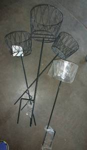 lot 46 image: FOUR New outdoor plant holders and 3 plant hangers