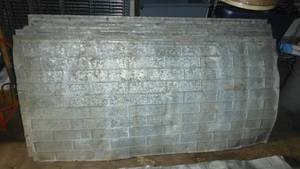 lot 110 image: TWO pieces of Vintage Barn Tin with brick pattern 60x28