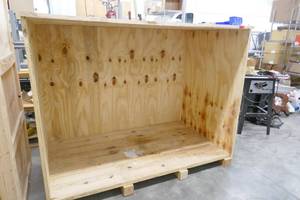 lot 94 image: Wood crate 78w 38d 70h, front is also included, standing behind the crate