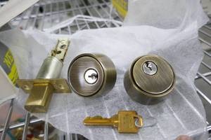 lot 137 image: Two New Deadbolt locks