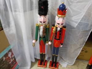 lot 10 image: 2 Nutcrackers 41 tall, needs heads...