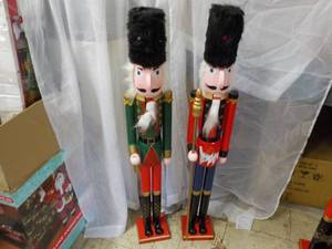 lot 11 image: 2 Nutcrackers 41 tall, needs heads...