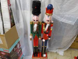 lot 12 image: 2 Nutcrackers 41 tall, needs heads...