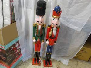 lot 18 image: 2 Nutcrackers 41 tall, needs heads...