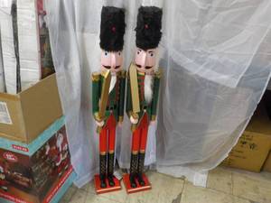 lot 19 image: 2 Nutcrackers 41 tall, needs heads...