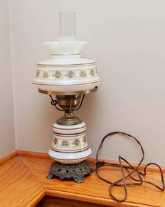 lot 87 image: Kerosene Style Plug-In Lamp