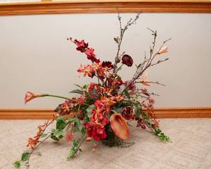 lot 120 image: Red Floral Arrangement with Resin Vase