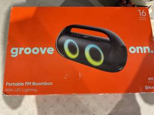 lot 328 image: Groove Onn. Portable FM Boombox with LED Lighting