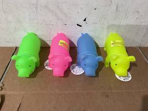 lot 281 image: LOT OF 65 Glow In The Dark Piggies
