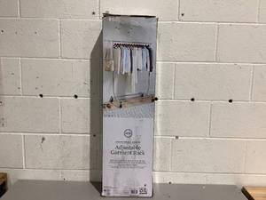 lot 490 image: Better Homes & Gardens 100lbs Heavy Duty Folding Adjustable Rolling Garment Rack, Chrome