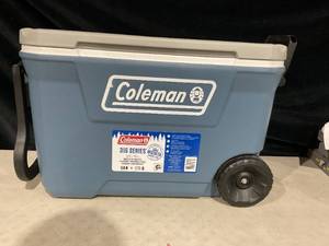 lot 358 image: Coleman 316 Series 62QT Hard Chest Wheeled Cooler