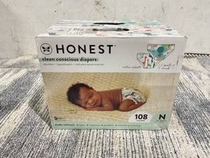lot 195 image: The Honest Company, Clean Conscious Disposable Baby Diapers, Above It All & Giraffes Prints, Size NB, 108 Count