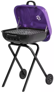 lot 558 image: Americana Walk-A-Bout Portable Charcoal Grill