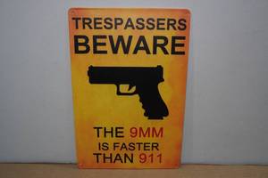 lot 98 image: Metal Trespassers Sign