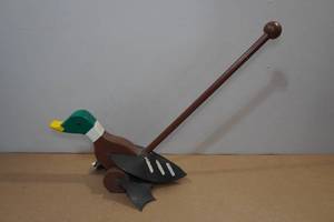 lot 147 image: Vintage Childs Floor Slapping Duck Toy