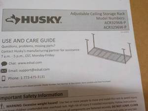 lot 38 image: Husky Adjustable Ceiling Storage Wh...