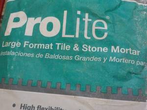 lot 78 image: 30 lb. bag Prolite Large Format Til...