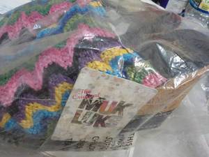 lot 82 image: size 10 pair MukLuks Dress Sandals...