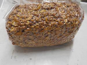 lot 165 image: 12 12 lb. bag Honey Roasted Cashew...