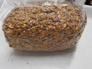 lot 166 image: 12 12 lb. bag Honey Roasted Cashew...