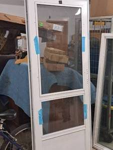 lot 499 image: Pre-Hung Storm Door 32x81