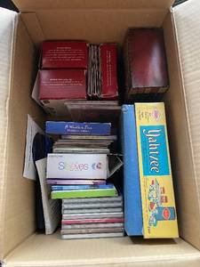 lot 8 image: Assortment of Mixed Media Items - Games, CDs, and More