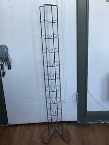 lot 66 image: Vintage Black Wire Magazine Rack with Wooden Base