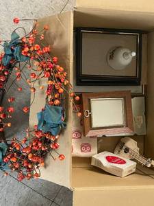 lot 92 image: Assortment of Decorative Items and Books - Includes Wreath, Bell, and Shower Curtain Hooks