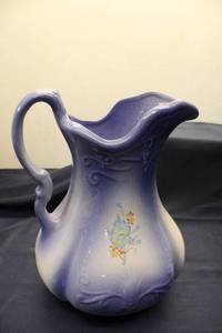 lot 62 image: Vintage Ceramic Pitcher with Floral Design