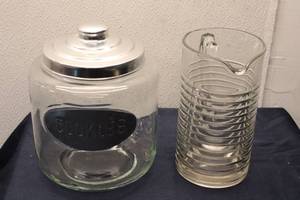 lot 63 image: Vintage Glass Cookie Jar with Stainless Steel Lid and Ribbed Glass Pitcher