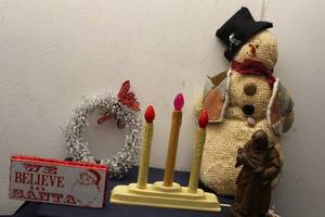 lot 72 image: Lot of Vintage Christmas Decorations including Snowman, Wooden Statue, and Light-Up Candle Holder