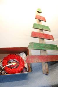 lot 51 image: Holiday Decor Collection - Wooden Christmas Tree, Red Wreath with Light, Vintage Christmas Sign, Green Glass Creamer, Red Candle, Rustic Driftwood Tree