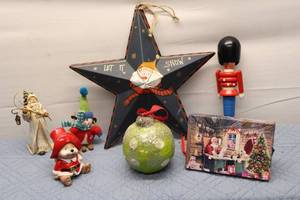 lot 54 image: Collection of 7 Holiday Decorations Including Snowman Stars and Nutcracker