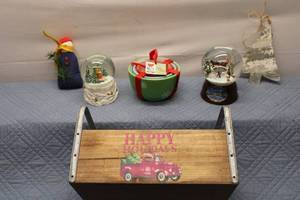 lot 56 image: Collection of Holiday Decor Items Including Snow Globes and Nested Bowls